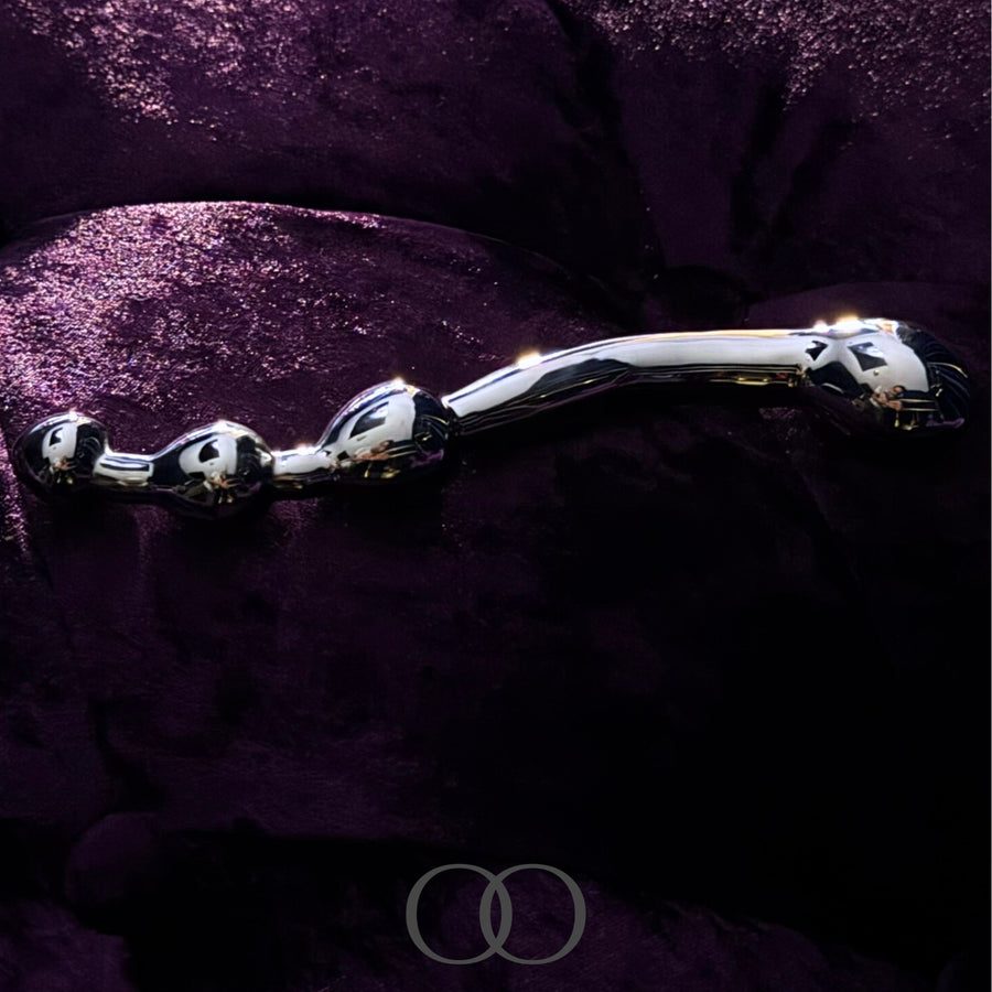 The Pleasure-Wand Solid Stainless Steel Graduated Bead Dildo with Sculpted Handle for Weighty, Penetrative Play